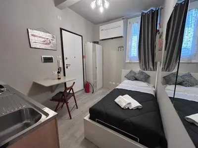 Letto o letti in una camera di Solo nel Cuore di Firenze