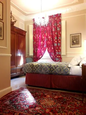 Letto o letti in una camera di Casa Alessandro Firenze