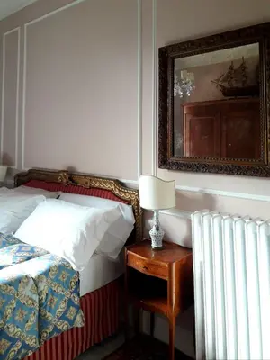 Letto o letti in una camera di Casa Alessandro Firenze