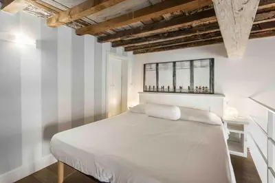 Letto o letti in una camera di Verrazzano Loft by MMega