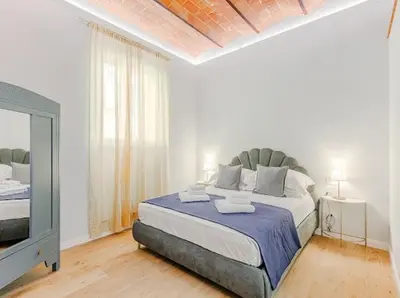 Letto o letti in una camera di Dimora Cimabue, Apartment near the Center