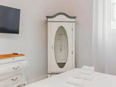 Letto o letti in una camera di Dimora Cimabue, Apartment near the Center