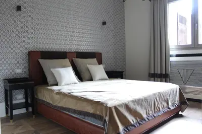Letto o letti in una camera di Luxury Space Michelangelo