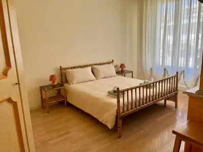Letto o letti in una camera di Penthouse Arno river