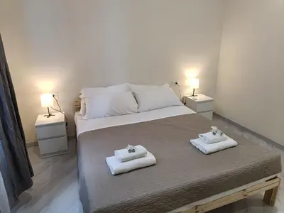 Letto o letti in una camera di Santo Spirito Rooms