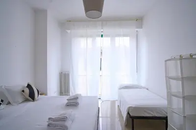 Letto o letti in una camera di SMN-Duomo Two-Room Apartment