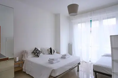 Letto o letti in una camera di SMN-Duomo Two-Room Apartment