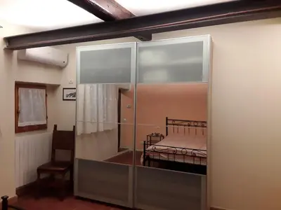 Letto o letti in una camera di - Antina Firenze -