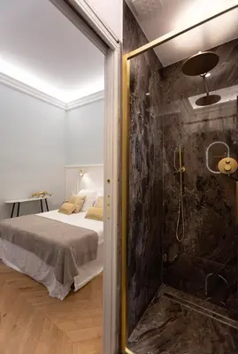 Letto o letti in una camera di BLUE SUITE - Pitti Place Residence