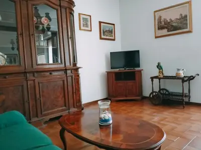 TV o dispositivi per l'intrattenimento presso Cozy Apartment Cirillo5