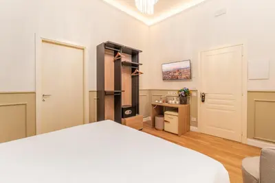 Letto o letti in una camera di Incanto Relais & Charme - dBe Hotels