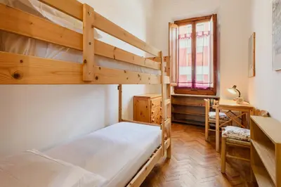 Letto o letti in una camera di La Margherita by MMega