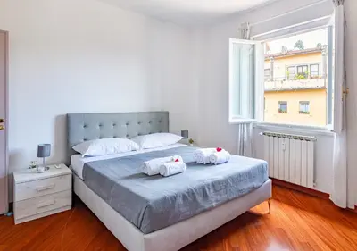 Letto o letti in una camera di brd 41 13- Ponte Vecchio Elegant Central Attic