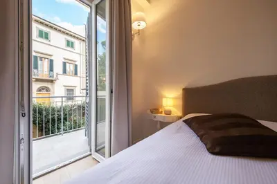 Letto o letti in una camera di Residenza Villani in Oltrarno, Florence