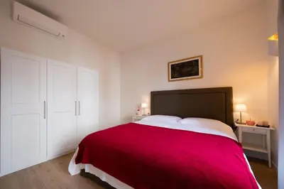 Letto o letti in una camera di Residenza Villani in Oltrarno, Florence