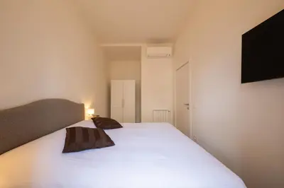 Letto o letti in una camera di Residenza Villani in Oltrarno, Florence