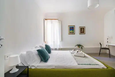 Letto o letti in una camera di Ghibellina Suites By San Firenze Collection