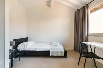 Letto o letti in una camera di Ghibellina Suites By San Firenze Collection