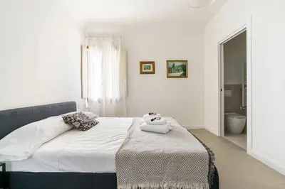 Letto o letti in una camera di Ghibellina Suites By San Firenze Collection