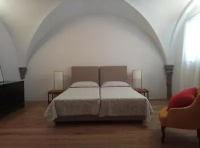 Letto o letti in una camera di Palazzo Capponi alle Rovinate