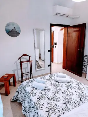 Letto o letti in una camera di Centrale