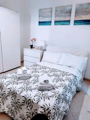 Letto o letti in una camera di Centrale