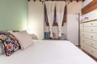 Letto o letti in una camera di Firenze centro con eleganza