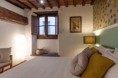Letto o letti in una camera di Firenze centro con eleganza