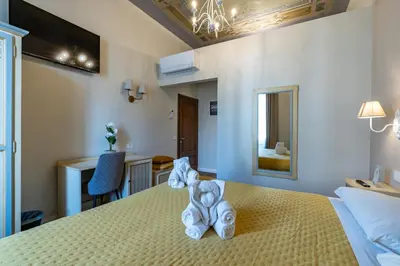 Letto o letti in una camera di Sweet Home XX Settembre