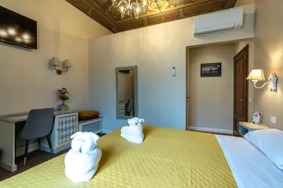 Letto o letti in una camera di Sweet Home XX Settembre