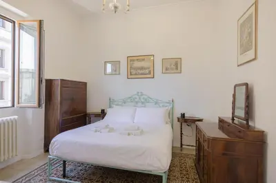 Letto o letti in una camera di Magide Fortezza Apartment Lavagnini