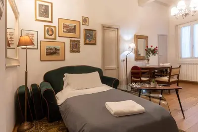Letto o letti in una camera di Amorino Vintage & Modern Retreat Central Florence