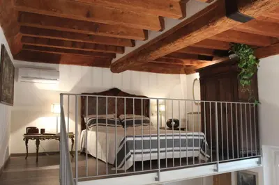 Letto o letti in una camera di Florence Pitti Loft