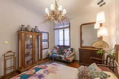 Letto o letti in una camera di Art Suite Statuto