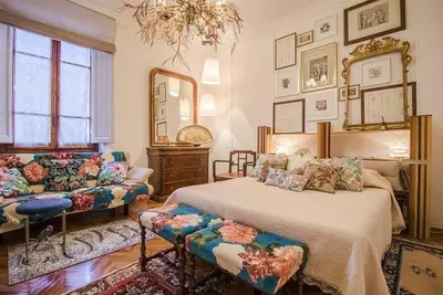 Letto o letti in una camera di Art Suite Statuto