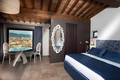Letto o letti in una camera di Il Miraggio Home Tower QK Costa 58 Rooftop