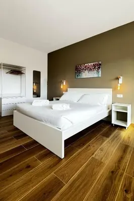 Letto o letti in una camera di Alma Suites - Terraced Penthouses
