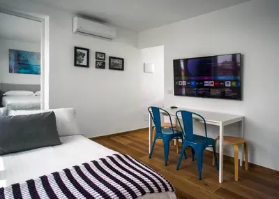 TV o dispositivi per l'intrattenimento presso Alma Suites - Terraced Penthouses