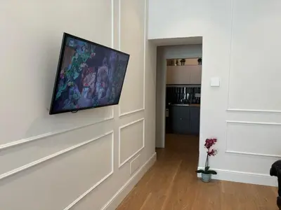 TV o dispositivi per l'intrattenimento presso Charm Florence Apartment