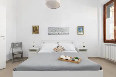 Letto o letti in una camera di Rifredi - Appartamento elegante e moderno a due passi dal centro