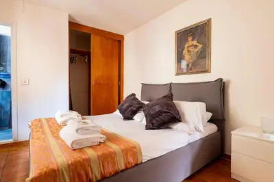Letto o letti in una camera di Very Central Apartment 5 mins from Train Station and Duomo
