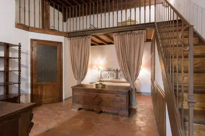 Letto o letti in una camera di San Niccolò Loft Suite