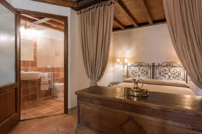 Letto o letti in una camera di San Niccolò Loft Suite