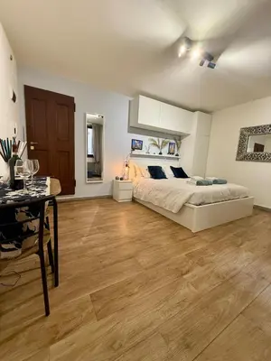 Letto o letti in una camera di Guelfa63 - Deliziosa Suite nel cuore di Firenze