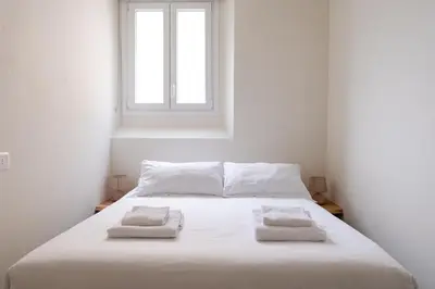 Letto o letti in una camera di Private Garden & Space Florence 2-Bed Apt