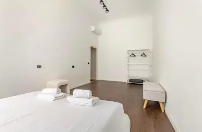 Letto o letti in una camera di Centralissimo e Ampio appartamento confortevole
