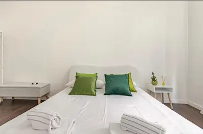 Letto o letti in una camera di Centralissimo e Ampio appartamento confortevole