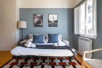 Letto o letti in una camera di Florence in Focus, by Belcanto Villas