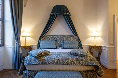 Letto o letti in una camera di The Loggia of Borgo SS Apostoli