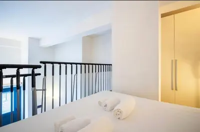 Letto o letti in una camera di Holiday Home Firenze - La Dimora di Maggie - 5 minutes from the centre free parking